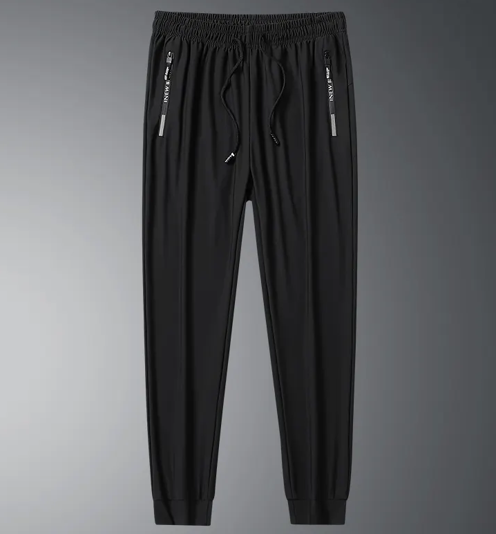 Спортивні штани з манжетами жіночі та чоловічі матеріал дуже легкий, швидко сохне чорні розмір М