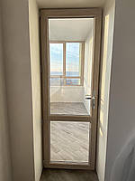Балконные двери ламинированные цвет Дуб Шефилд 700х2100 мм монтажная ширина 70 мм профиль WDS Ekipazh Ultra 70