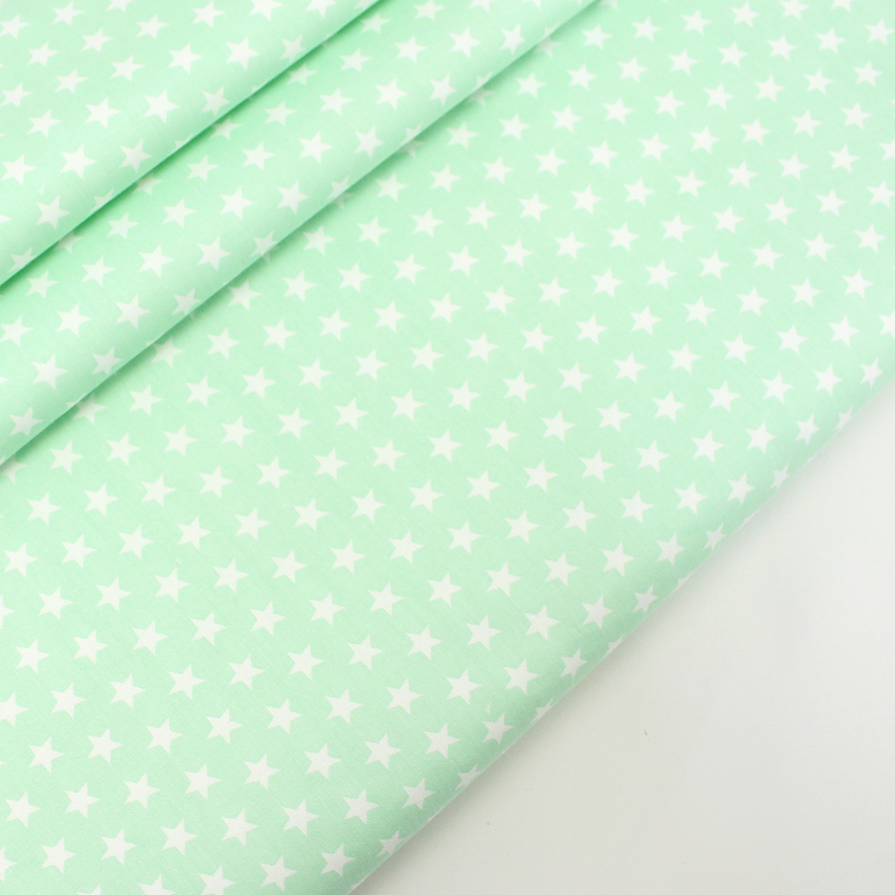 Сатин "Зірки загострені" білі на м'ятно-салатовому тлі No 160-354 с, фото 1