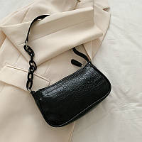 Женская сумочка багет в стиле рептилии черная