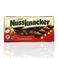 Шоколад молочный с лесным орехом NUSS KNACKER edel-vollmilchschokolade mit haselnuss 100г