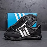 Демісезонні чоловічі чорні кросівки з білими смужками.