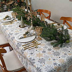 Скатертина на стіл новорічна  Сніжинки на білому сірі та золоті