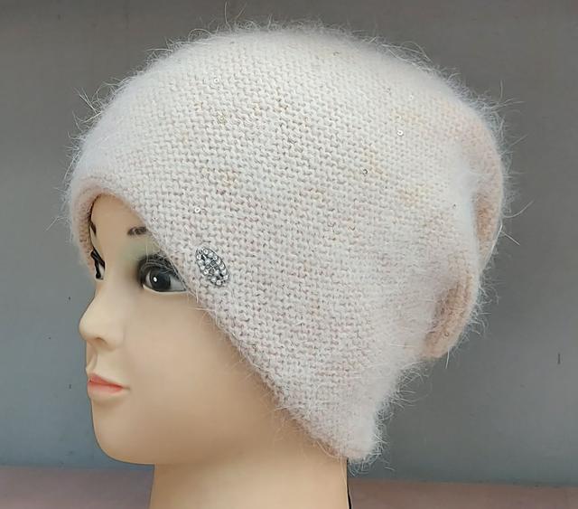 фотографія зимова жіноча шапка ангора с защипом