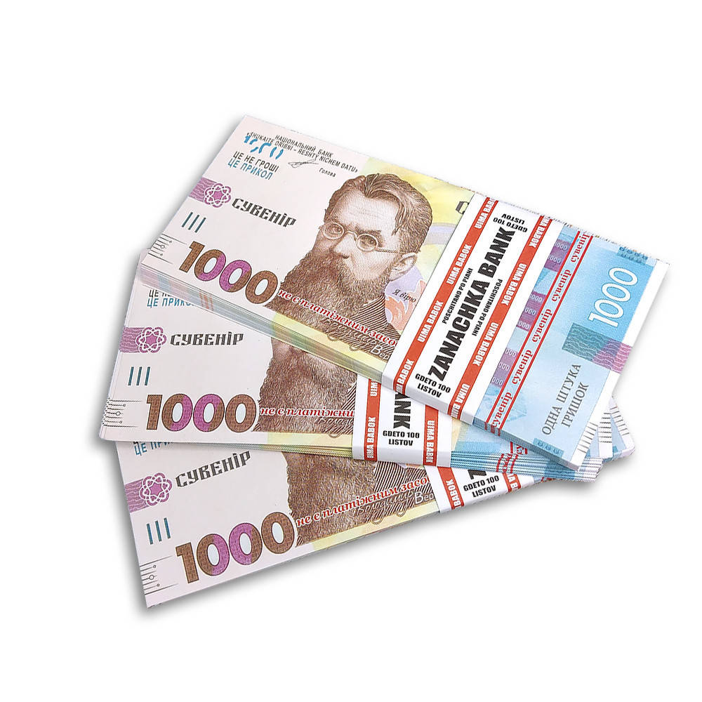 

Пачка денег по 1000 гривен 1296295317