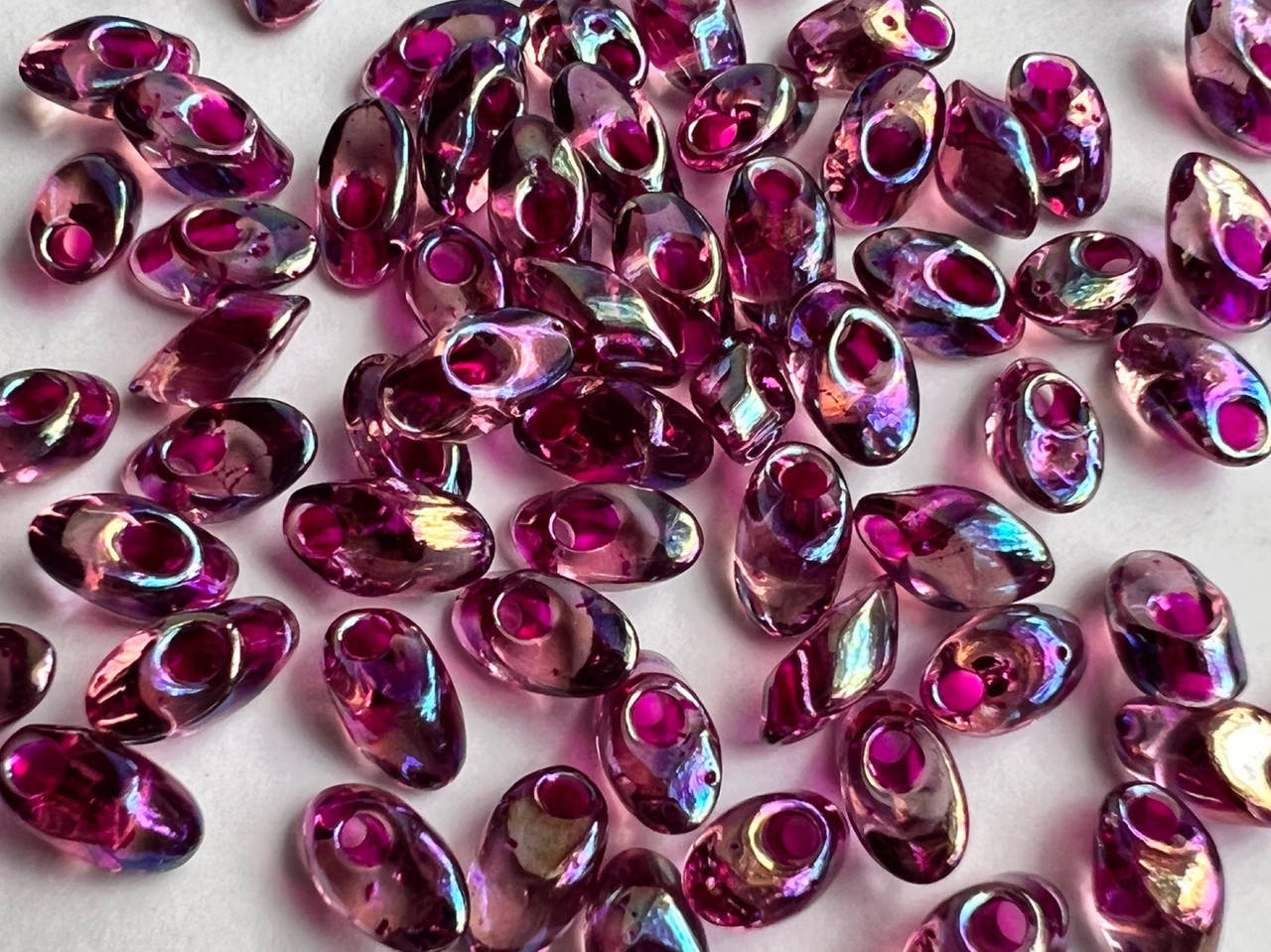 

Miyuki Long Magatama (LMA) 4 x 7 mm 2170 Fuchsia Lined Smoky Amethyst