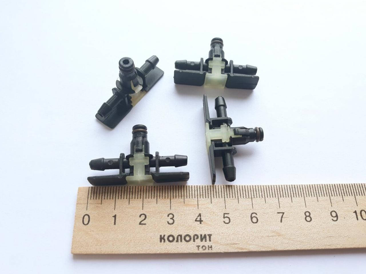 

Штуцер обратки форсунки VW пластик 2 выхода