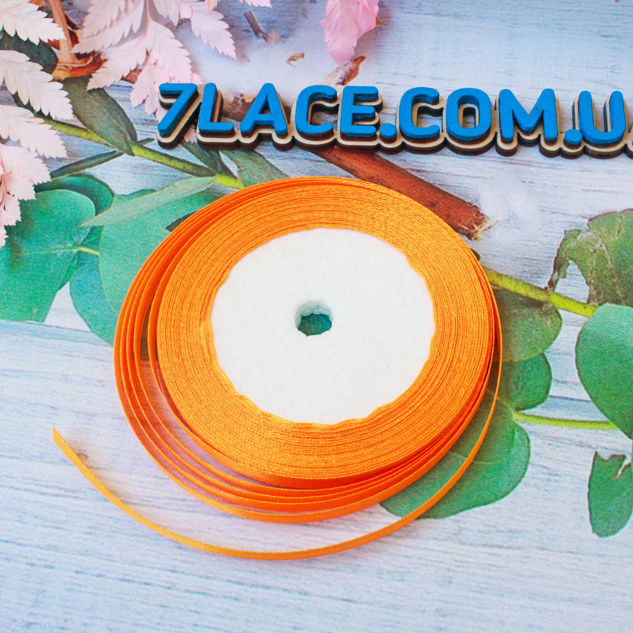 

Лента атласная однотонная / цвет оранжевый / ширина 0,6 см / бобина 23 м