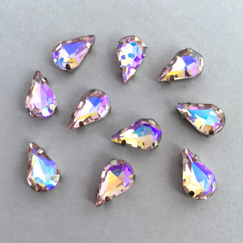 

Кристалл в оправе. Капля 8х13 мм. Розовый с АБ. Цвет оправы: серебро. Цена за 1 шт.