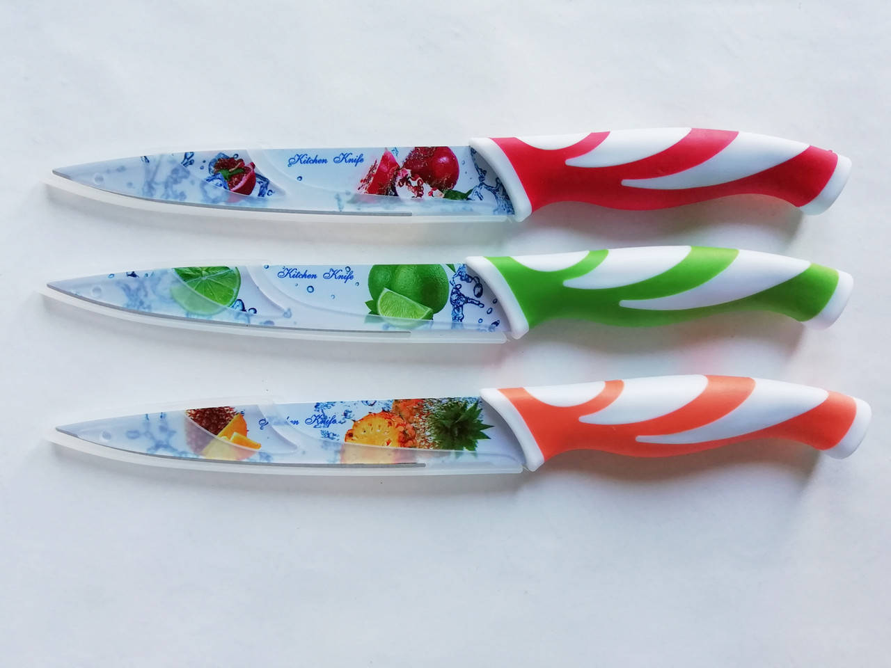 

Нож цветной металло-керамика бол., 24 см