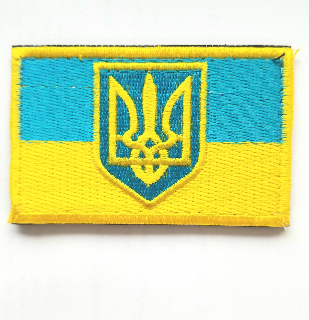 

Шеврон / нашивка "ПРАПОР УКРАЇНИ З ТРИЗУБОМ" (жовто-блакитний)
