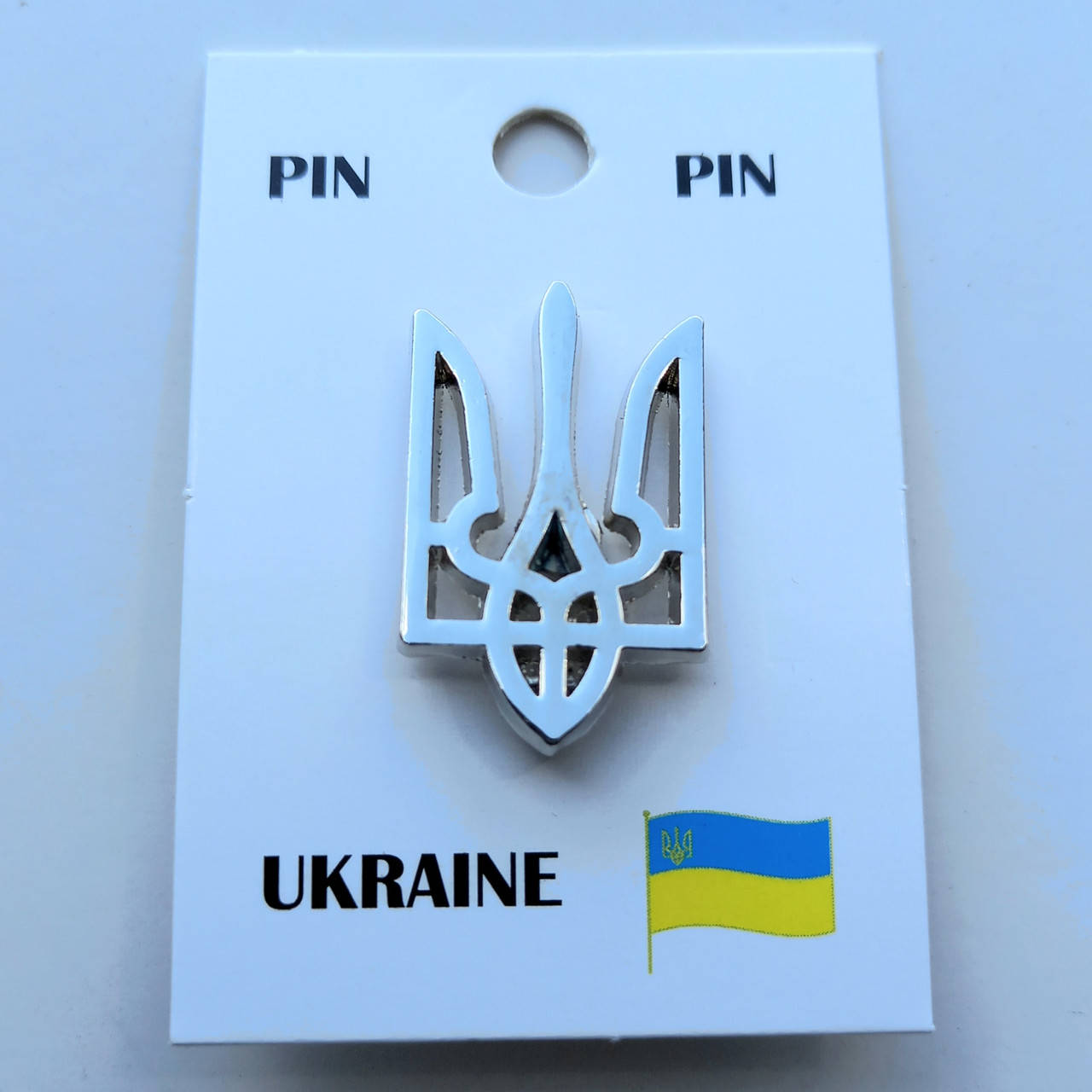

Значок Герб Украины , под серебро , 26х17 мм.