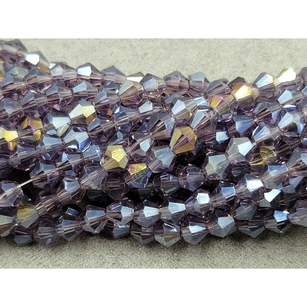 

Биконус (хрусталь) - 4 мм. В упаковке прим- 100 шт. Цвет - аметистовый с АБ