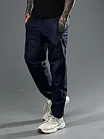 Чоловічі спортивні штани з плащової тканини із сітчастою підкладкою розміри від 50 до 56 Різні кольори