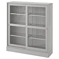 ХАВСТА Шкаф-витрина с цоколем, серый/прозрачное стекло, 121x37x134 см