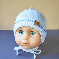 Демісезонна в'язана дитяча шапочка для новонароджених розмір 36-38 на трикотажній підкладці колір блакитний
