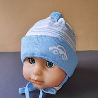 Демісезонна в'язана дитяча шапочка для новонароджених розмір 38-40 на трикотажній підкладці колір блакитний