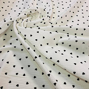 Тканина муслін жатий двошаровий, чорні сердечка на білому (шир.1,35 м) (MS-JAT-2-0091)