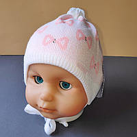 Демісезонна в'язана дитяча шапочка для новонароджених розмір 36-38 на трикотажній підкладці колір рожевий