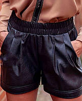 Шкіряні короткі жіночі шорти по таліі на резинці
