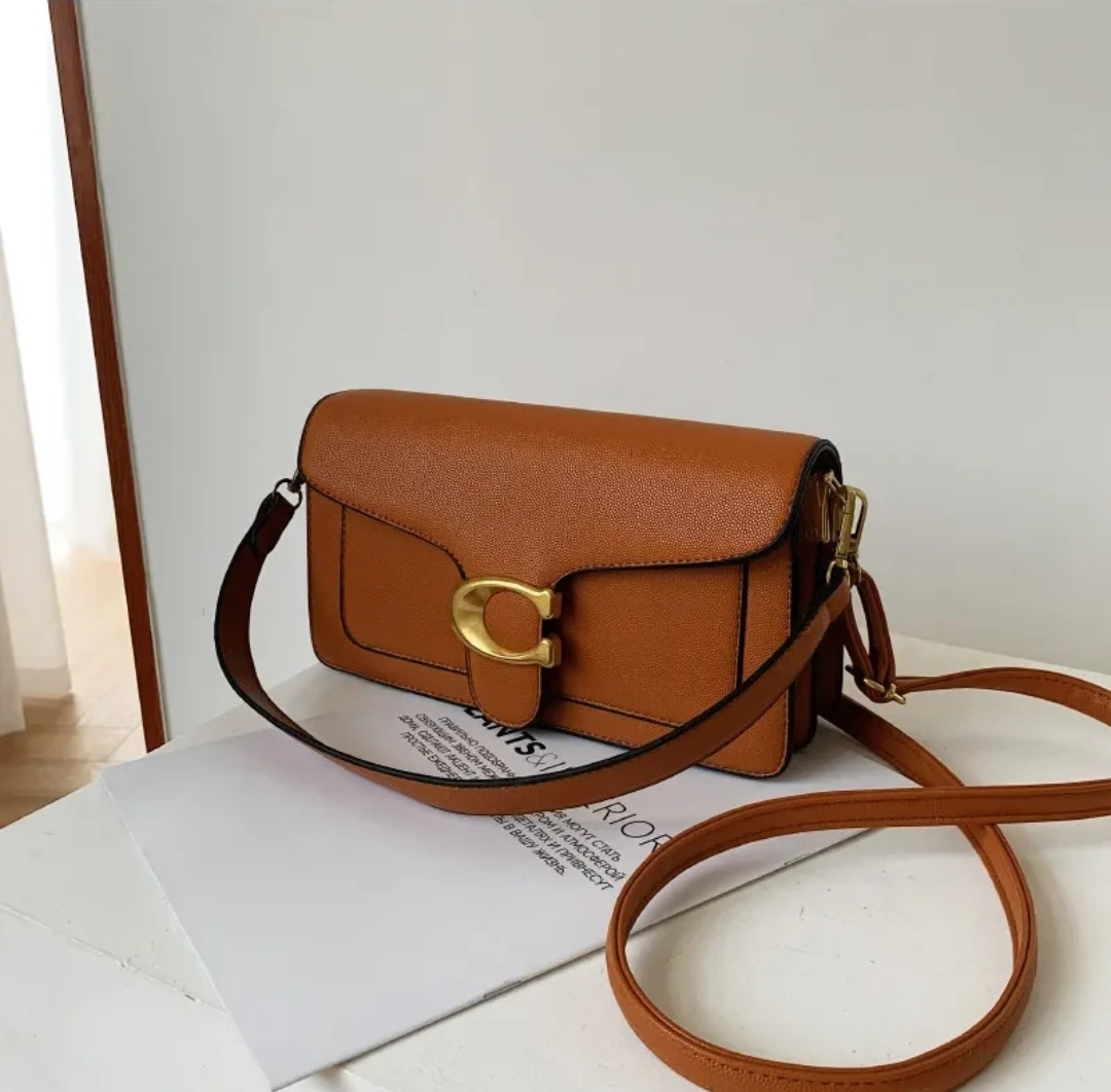 Сумка жіноча Coach коричневий колір крос-боді з довгим ременем через плече, фото 1