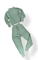 Жіночий трикотажний комплект з светра і штанів з деталями зелений Parkhande Туреччина розмір універсальний