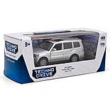 Іграшкова машинка металева MITSUBISHI PAJERO 4WD TURBO, мітсубісі паджеро турбо, срібний, відкр двері, інерція, 1:43 (250282), фото 8