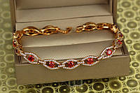 Браслет Xuping Jewelry Захоплення з червоним камінням 17 см 6 мм золотистий
