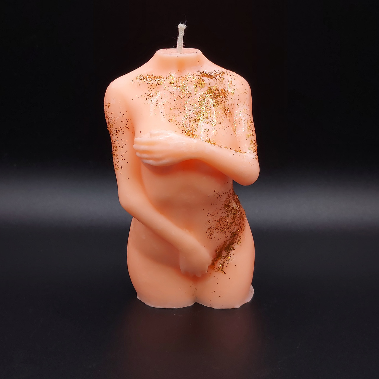 Свічка у формі жіночого торсу "Скромняжка" помаранчевого кольору