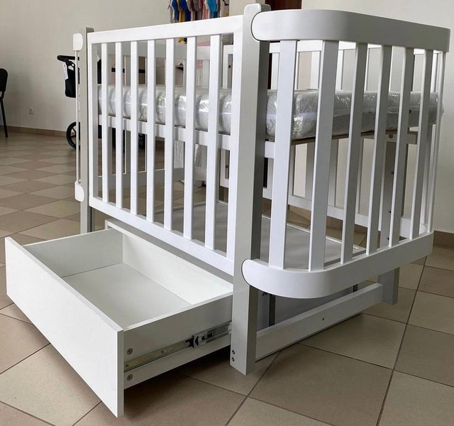 Дитяче ліжечко з маятником та шухлядою Марсель Angel baby Дитяче ліжечко з маятником та шухлядою Марсель Angel baby
