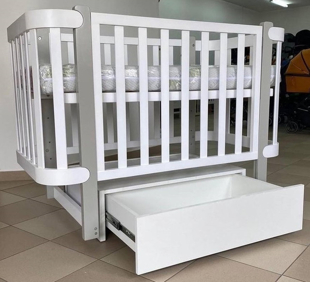 Дитяче ліжечко з маятником та шухлядою Марсель Angel baby Дитяче ліжечко з маятником та шухлядою Марсель Angel baby