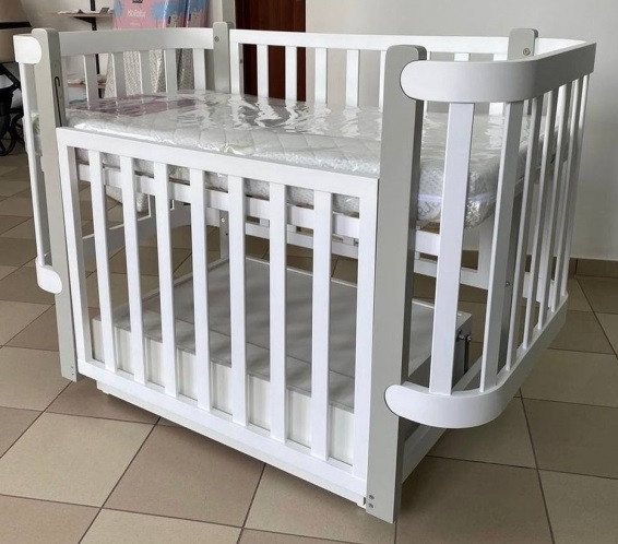 Дитяче ліжечко з маятником та шухлядою Марсель Angel baby Дитяче ліжечко з маятником та шухлядою Марсель Angel baby