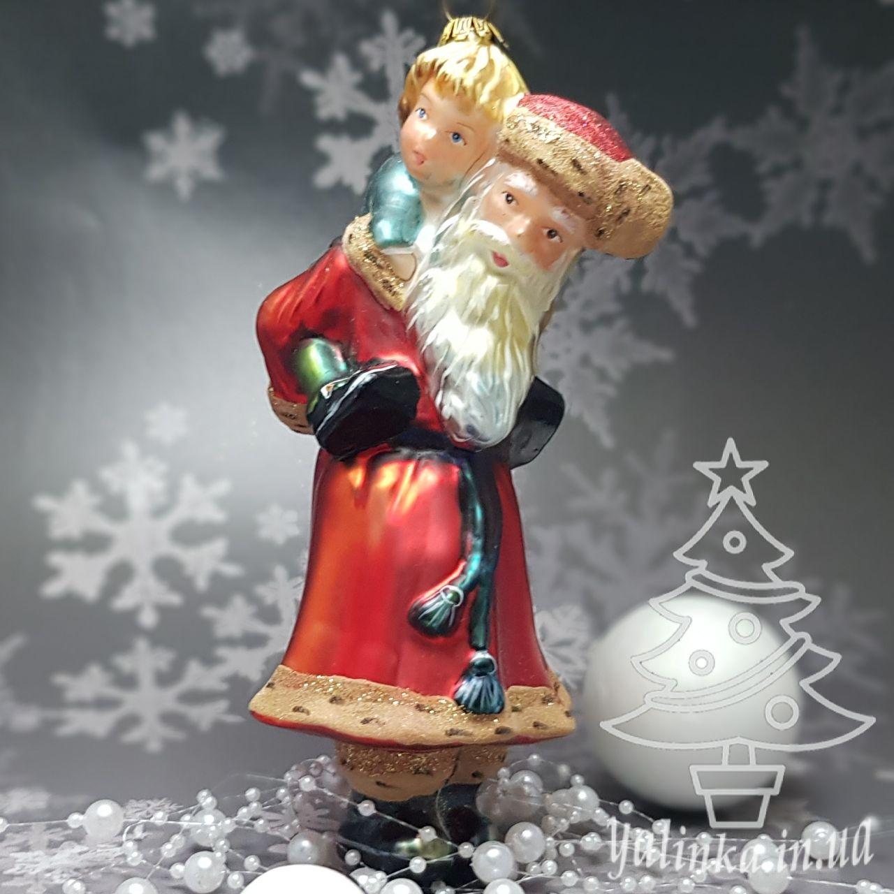Скляна ялинкова іграшка Санта с  мальчиком на плечах  Komozja Family Santa Claus