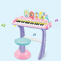 Синтезатор детский с микрофоном и стульчиком звуковые и световые эффекты DJ 207 розовый