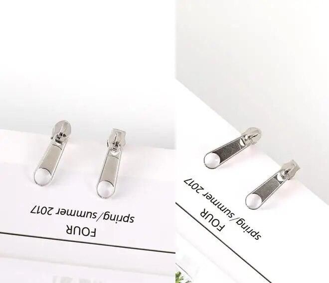 Сережки у формі замка на блискавку із сталі унісекс, фото 1