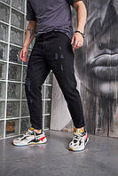 Чорні рвані джинси-котон Джинси молодіжні стильні повсякденні звужені донизу на осінь Lnx
