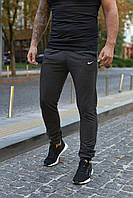 Брюки мужские трикотажные Nike темно-серые TOS