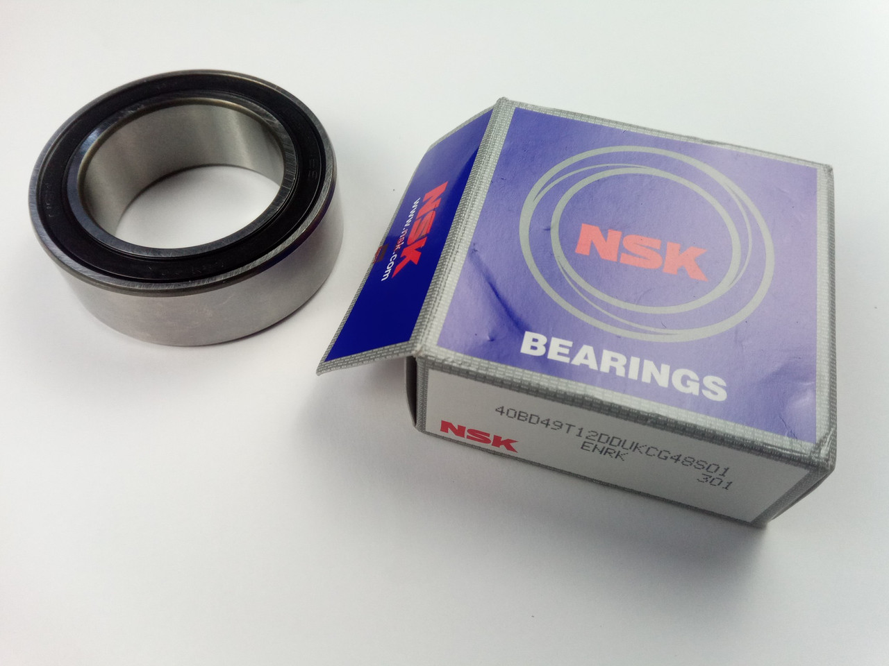 Підшипник шківа компресора конд. 40x62x20.5 NSK (40BD49) Lanos (40BD49T12DDUKCG48S01), фото 1