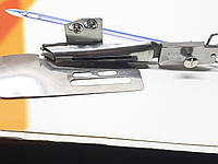 Встроенный окантователь в 2 сложения вход 25 мм выход 12,5 мм под резинку для распошивальних швейних машин