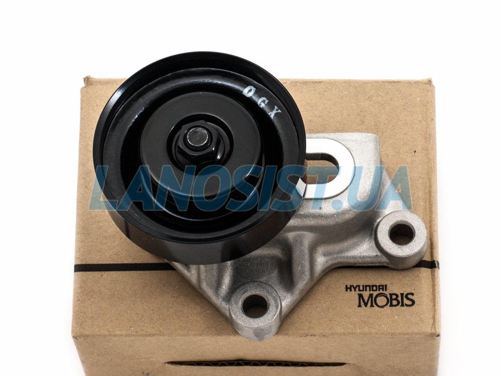 Ролик ременя кондиціонера Carens Cerato Sportage Tucson (у зборі) MOBIS 977042D520