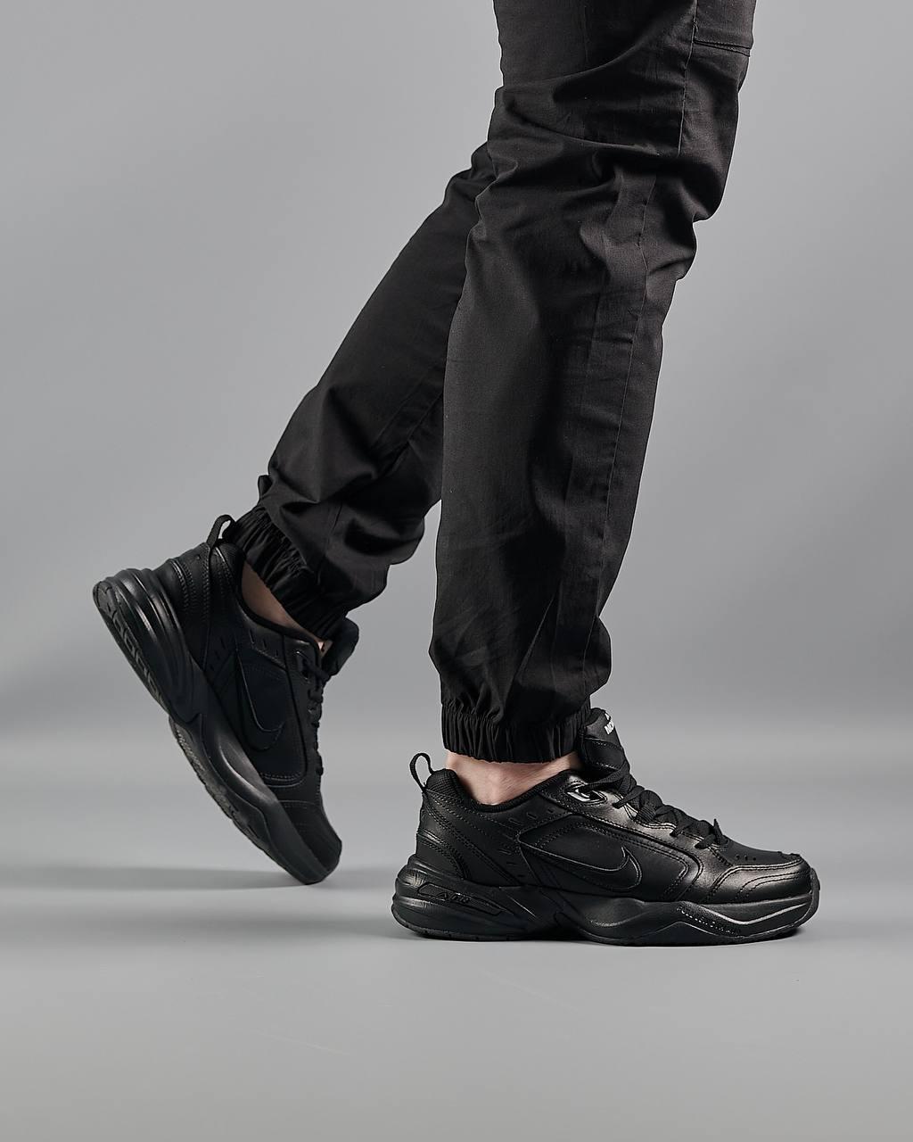 Nike air monarch sales triple black