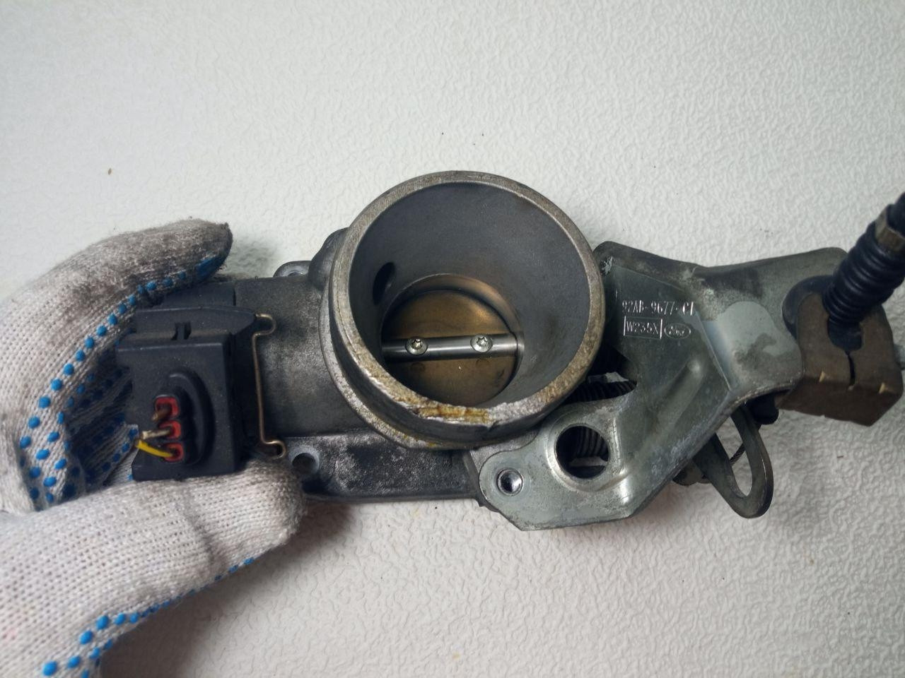 Дросельна заслінка Ford 928F-9U53B-D / 92AB-9677CE / W235X