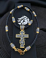 Кожаный шнурок с серебряными позолоченными православными вставками и крестом.