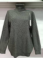 Женский свитер с высоким горлом с красивой вязкой на рукавах и спереди 48/50