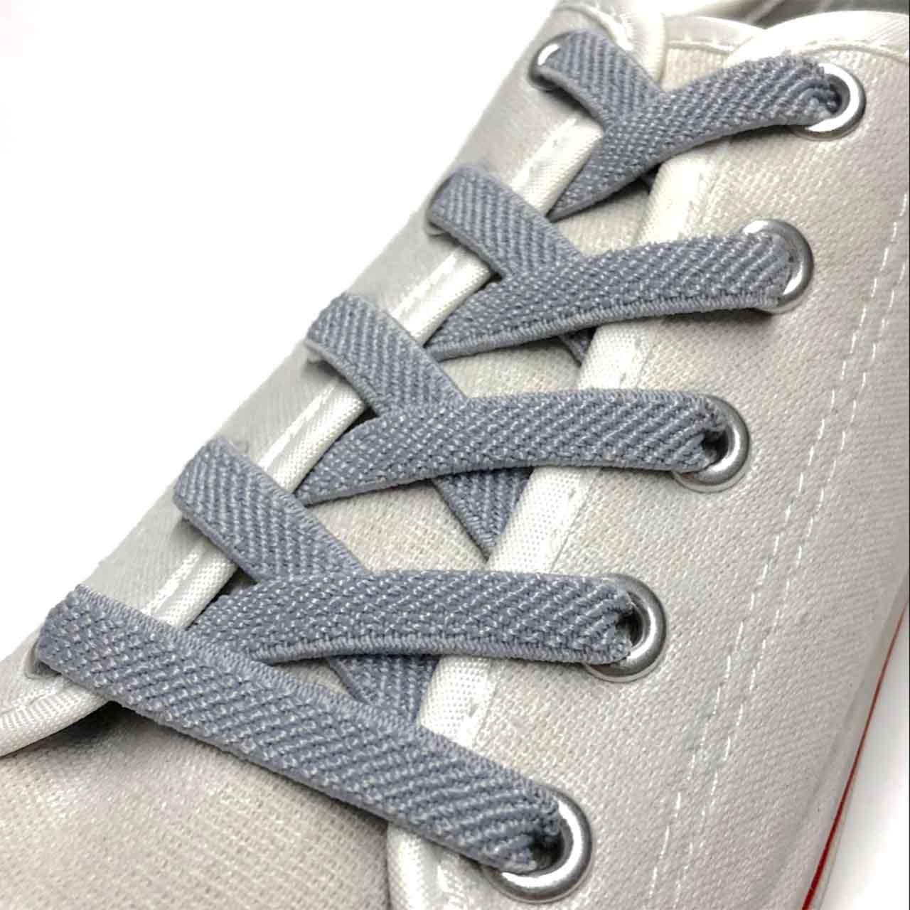Шнурки резиновые для обуви (70см) плоские, цвет светло-серый, ширина 7мм. - фото 1 - id-p2007106850