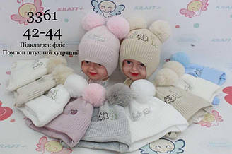 Шапка зимова в'язана з підкладкою на флісі, на зав'язках із 2 бубонами, Яскраво-червоне Дітинство (розмір 42-44)