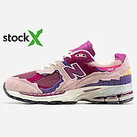 0739 New Balance 2002R Pink