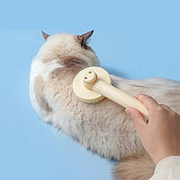 Щітка - пуходерка для вичісування котів та собак з кнопкою самоочищення кругла - блакитна, фото 9