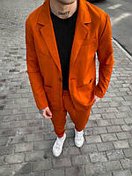 Оранжевий брючний костюм чоловічий однотоний