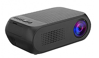 Портативный проектор Led Projector YG320C мультимедийный домашний кинотеатр черного цвета с лед лампой.